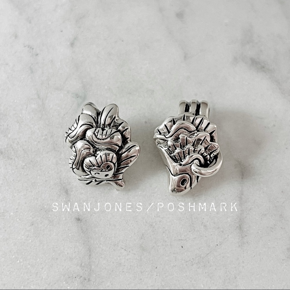2 Silver Charms